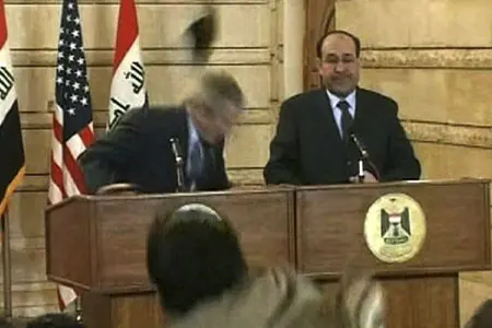 George Bush thrown shoe ducks Maliwi does not
