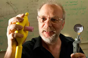 University of Chicago physicist Heinrich Jaeger uses a soft gripper to hold up a vial University of Chicago physicist Heinrich Jaeger uses a soft gripper to hold up a vial