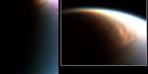 Cassini Images Mammoth Cloud Engulfing Titan's North Pole