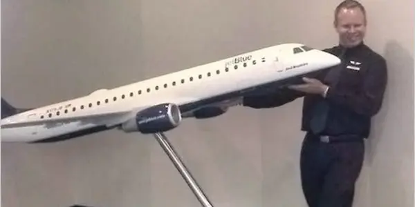 Flight attendant uses inflatable emergency slide to escape annoying passenger
