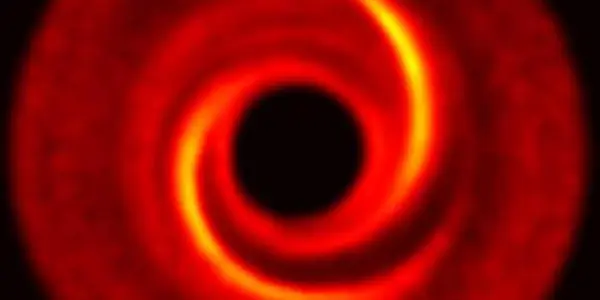 Spirals In Dust Around Young Stars May Betray Presence Of Massive Planets