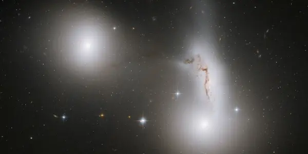 A Gravitational Tug Of War In Piscis Austrinus