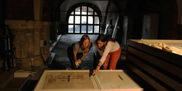 Studying The Silk Tunics And Relics Of St. Ambrose