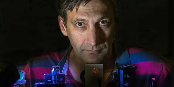 Quantum Whirlpool Stirred By Spiral Laser Beam