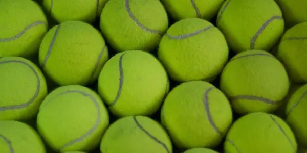 How Many Ways Can You Arrange 128 Tennis Balls? An Apparently Impossible Problem Solved